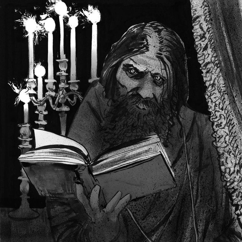 Bearded man reading by candelabra light